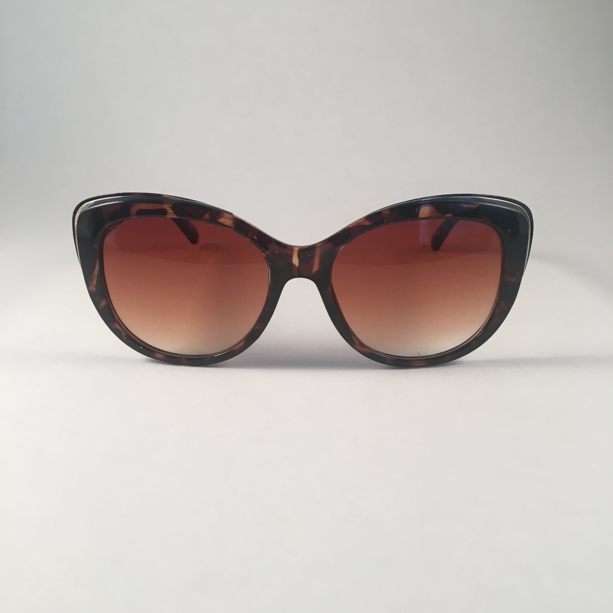 Tan Tortoiseshell Curved Sunglasses