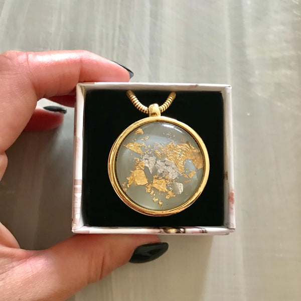 The World Amulet Gold/Grey